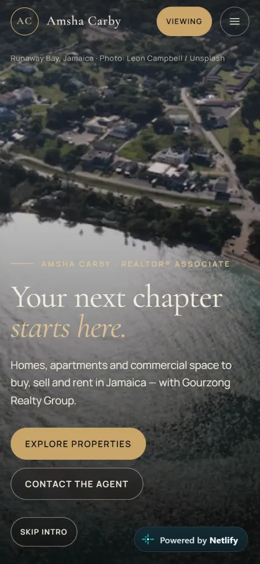 Amsha Carby on a phone: aerial hero with Explore Properties and Contact buttons